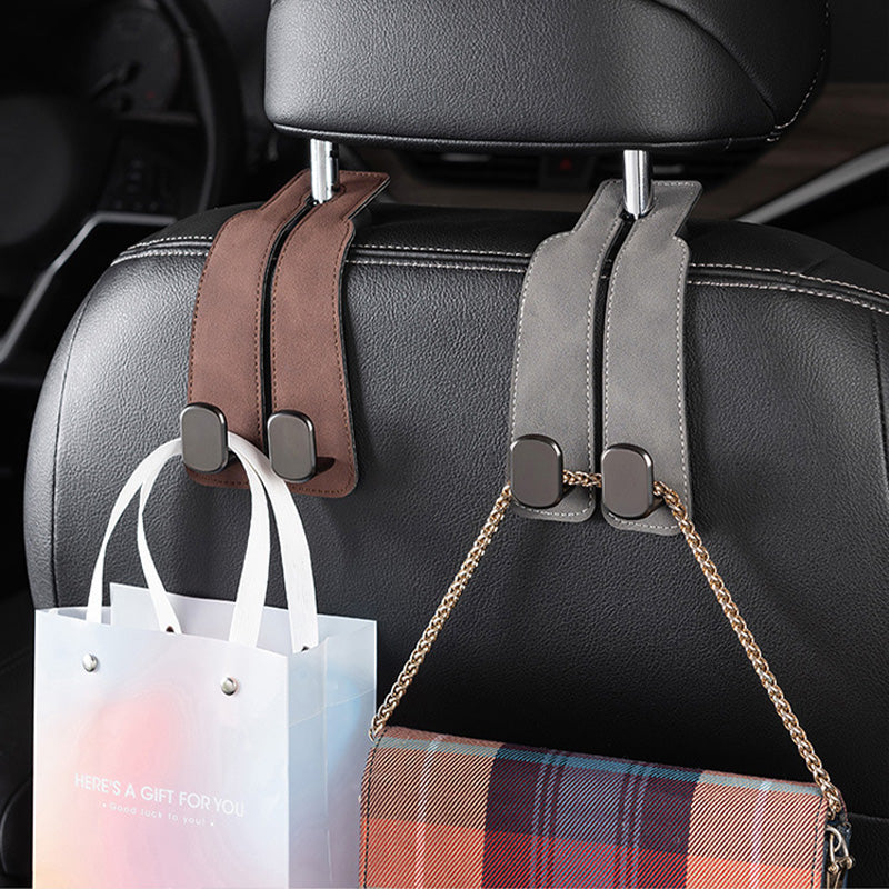 Tired of shopping bags rolling around your boot? 🚗 Grab our stylish seat hooks – 10-second install, zero clutter.