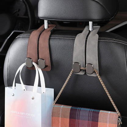 Tired of shopping bags rolling around your boot? 🚗 Grab our stylish seat hooks – 10-second install, zero clutter.