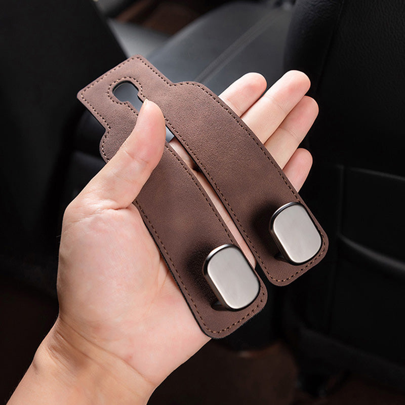 Tired of shopping bags rolling around your boot? 🚗 Grab our stylish seat hooks – 10-second install, zero clutter.