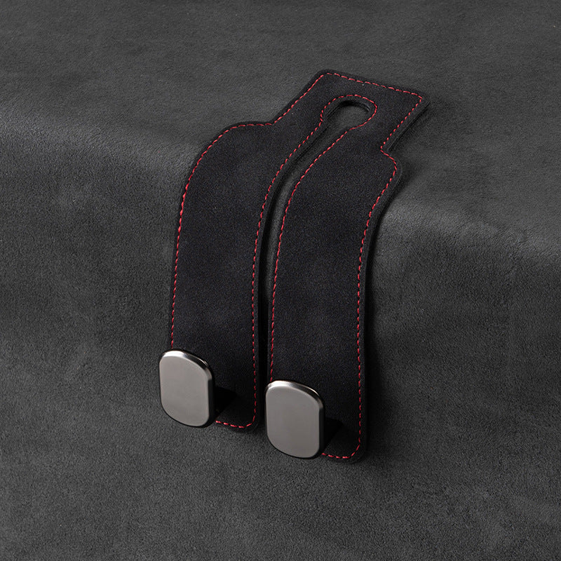 Tired of shopping bags rolling around your boot? 🚗 Grab our stylish seat hooks – 10-second install, zero clutter.