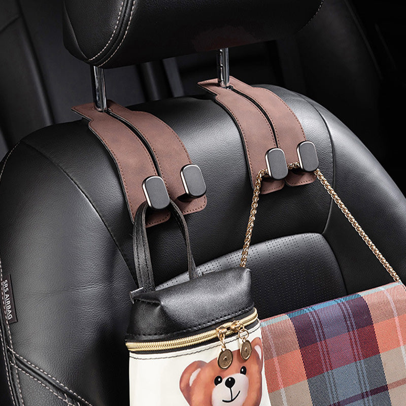 Tired of shopping bags rolling around your boot? 🚗 Grab our stylish seat hooks – 10-second install, zero clutter.