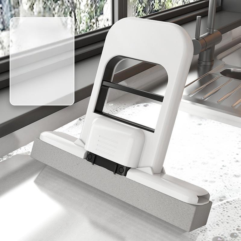 Small portable automatic water-absorbing desktop mop